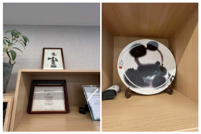 （Daniel 办公室里摆放着中国传统工艺品）