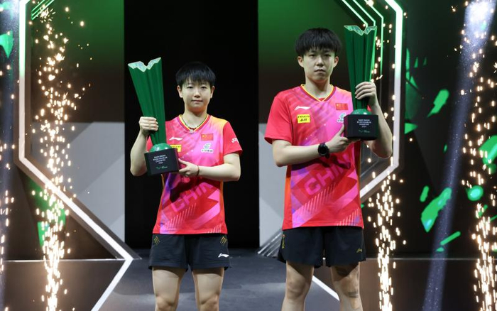 沙特大满贯赛，王楚钦（右）/孙颖莎混双夺冠。  图/新华社