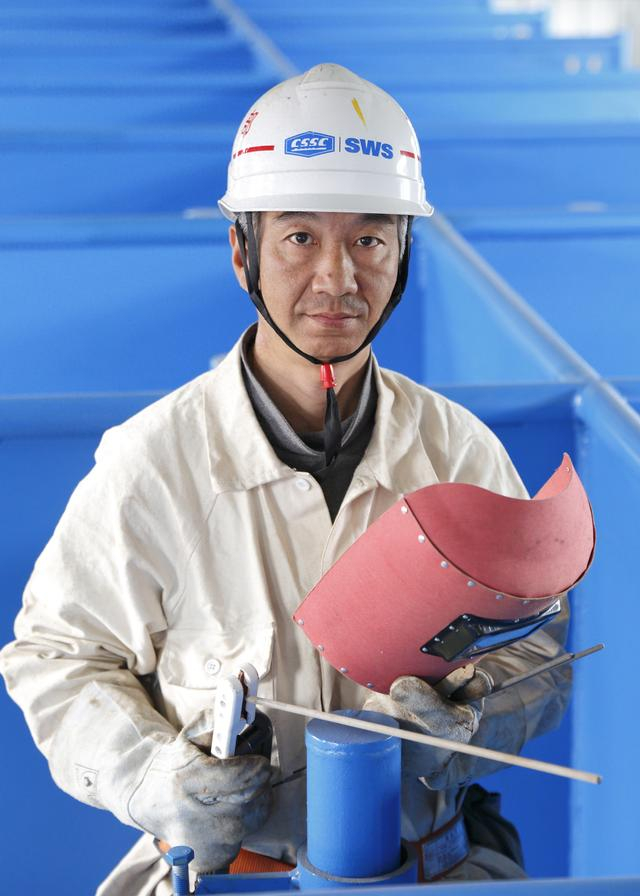 中国式现代化奋进者|国产大型邮轮项目背后有"一把焊枪"