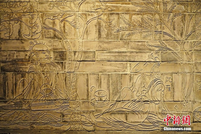 图为南朝"竹林七贤与荣启期"砖画.