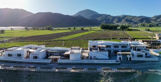 图为农庄位于阿禾公路起始点