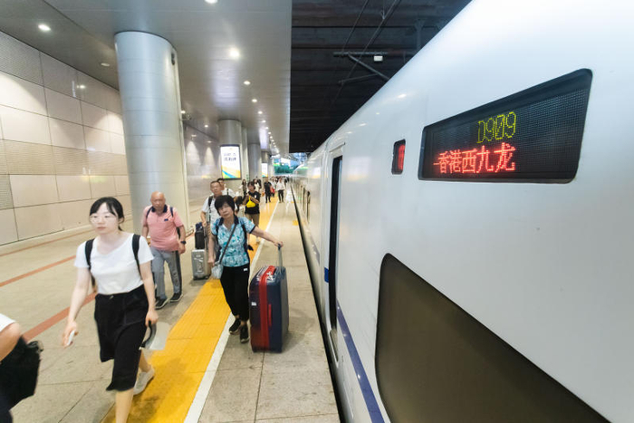 旅客有序乘车。中国铁路北京局供图