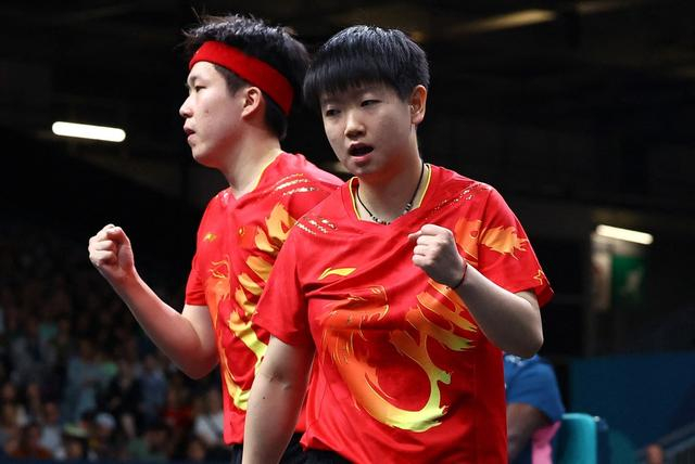 王楚钦、孙颖莎庆祝。图源：IC photo