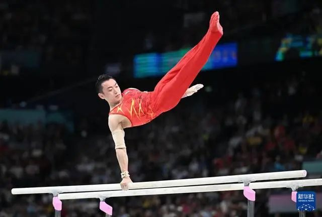 8月5日，中国选手邹敬园在比赛中。新华社记者 程敏 摄