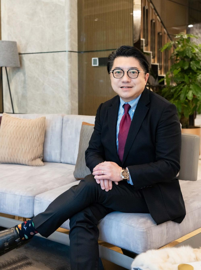 和记地产集团有限公司董事（市场）兼董事（企业业务发展）谭健旭