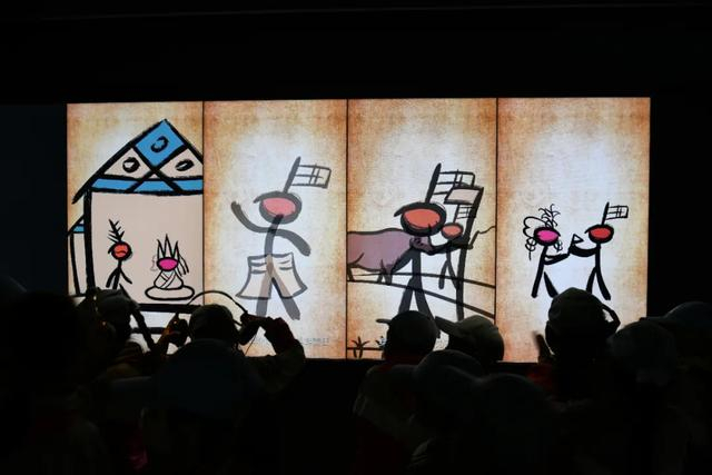 图为丽江市博物院内展出的东巴文化展。图源：丽江发布