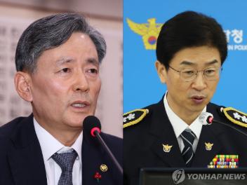 韩国警察厅长赵志浩（左）和首尔警察厅长金峰植 韩联社