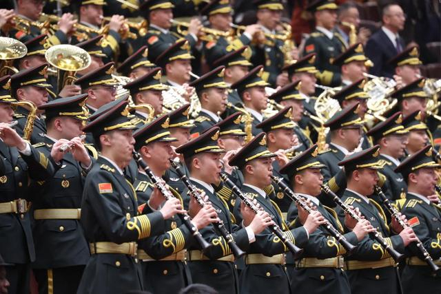 3月4日，全国政协十四届三次会议在北京人民大会堂举行开幕会。这是军乐团在演奏。新华社记者 庞兴雷 摄