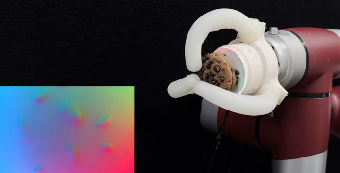 软体机器手抓取曲奇饼干时，呈现的视触觉感知纹理 图片来源：上海交大机器人研究所