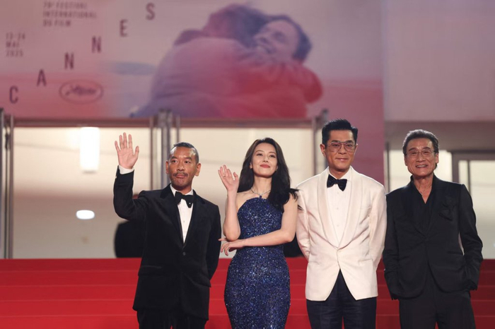 《风林火山》导演麦浚龙（左）和主演高圆圆、古天乐、梁家辉在戛纳红毯上