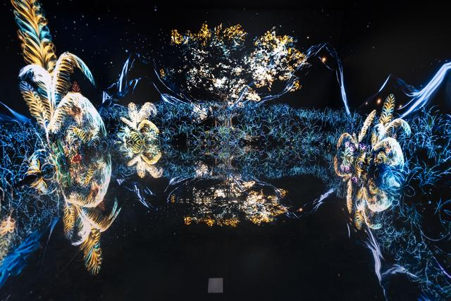 人民网原创AI剧目《时空绘影·湾区开新局》在“梦幻灵境mini版”展出。人民网 张志强摄