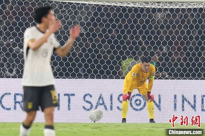 中国队球员在比赛中。图片来源：视觉中国