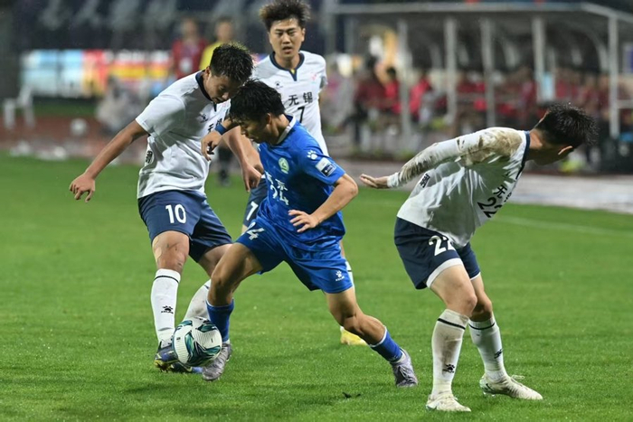 南京队与无锡队的比赛十分激烈