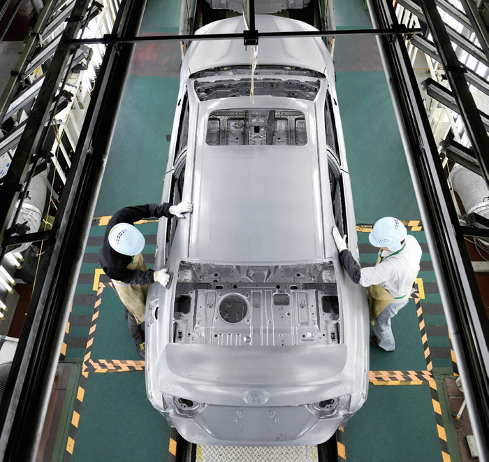 在日本爱知县的一处丰田普锐斯汽车生产线。图/法新