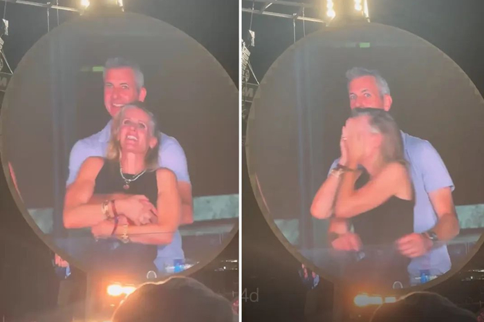 Astronomer首席执行官（CEO）安迪·拜伦搂抱公司人力资源总监（HR）克里斯汀·卡伯特 图源：美媒