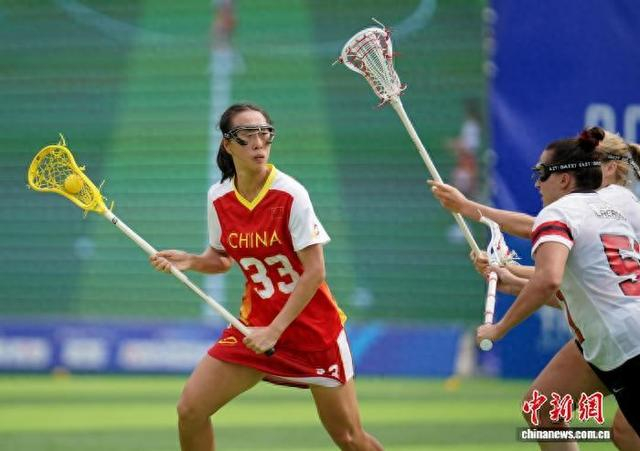 图为9日中国队与加拿大队比赛现场。 记者 安源 摄