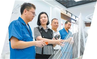 河南焦作武陟县招商团队到目标企业招商。王琳锋摄