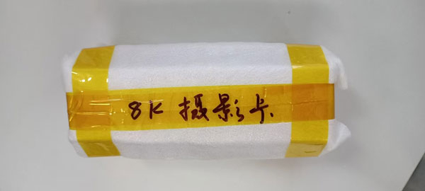 神舟十三号乘组从空间站带回来的摄影卡 朱翌冉供图