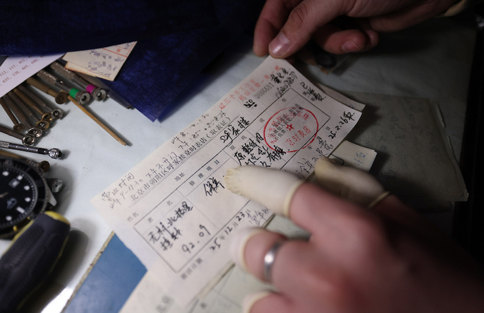 袁亮为郭先生开好的维修单。