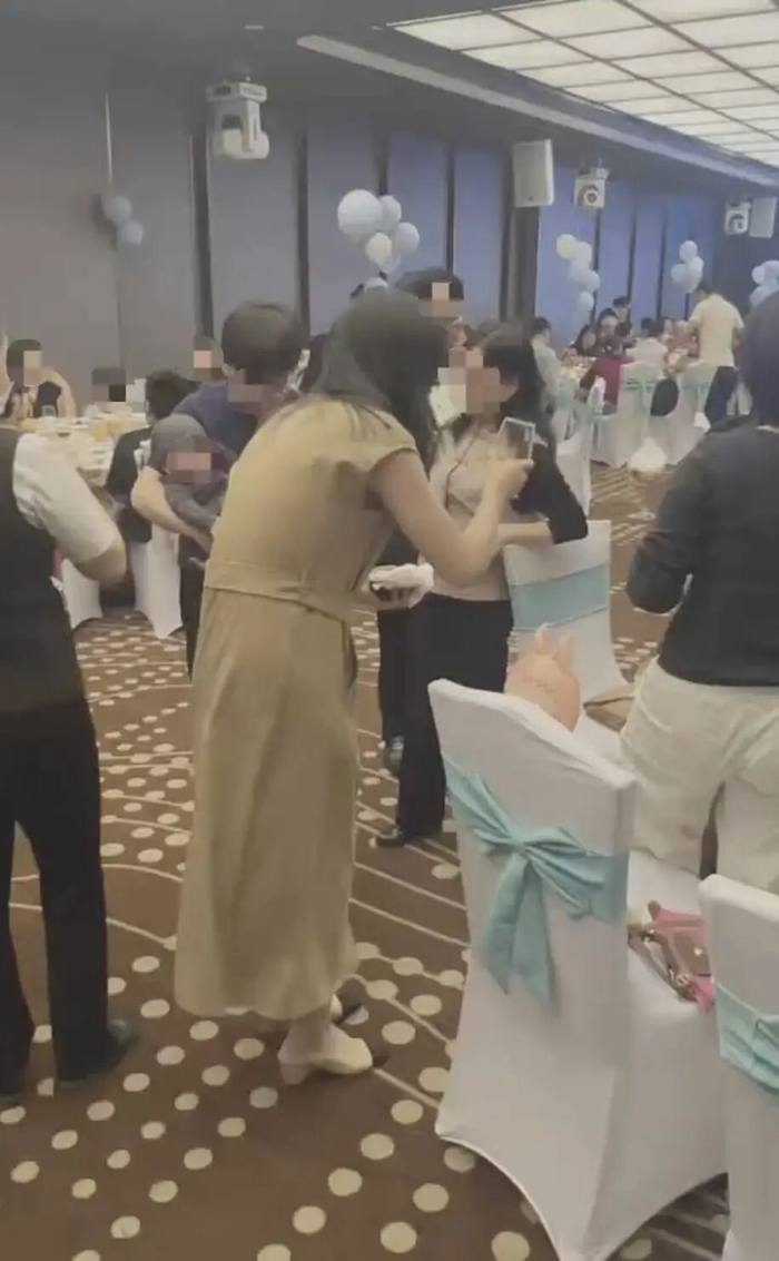 刘庆与情人的孩子百日宴现场照片（受访者供图）