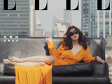 马思纯登ELLE5月刊封面，天台迎风展笑颜