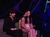 那英在观看窦靖童表演时流泪的主要原因是什么？