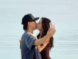 易梦玲回应“与胡彦斌海边合影接吻视频”是AI，AI从业者鉴定来了