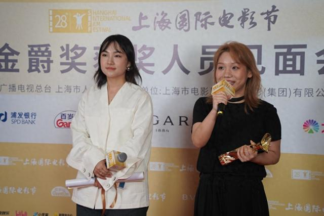 马福福（左） 李思洁/图