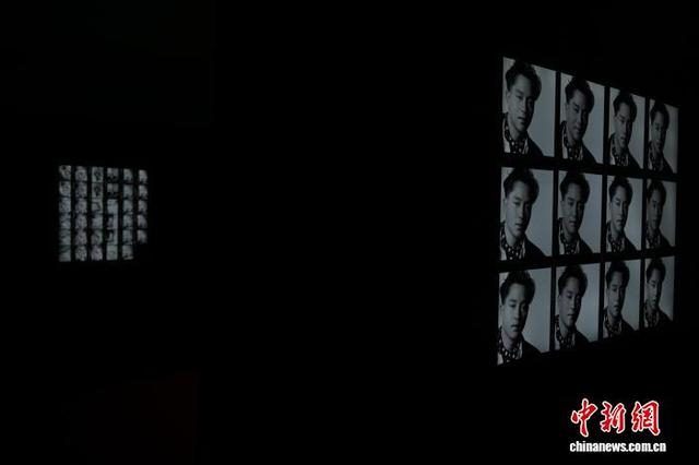 图为展出的张国荣照片。中新网记者 陈永诺 摄