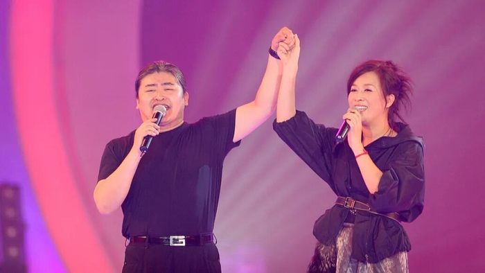 2006年7月13日,“志愿北京”演唱会，刘欢与那英。视觉中国 资料图