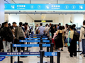 贵州贵阳：免签红利释放 假期口岸通关高效顺畅