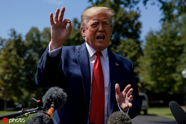 特朗普周三在白宫外答记者问 @IC Photo