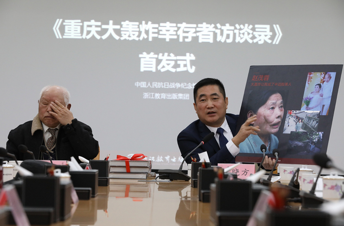  幸存者粟远奎和本书作者李晓方