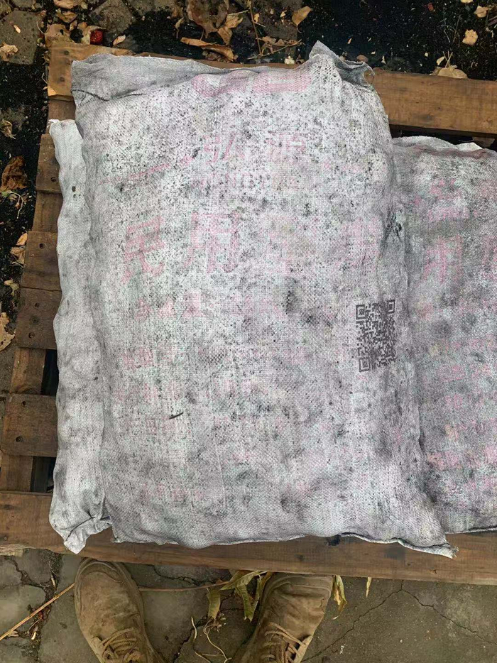 ▲死者那某事发前烧的煤。图片来自新京报网