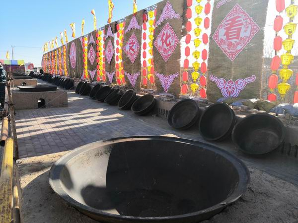 用来做“牛娃子饭”的大锅。