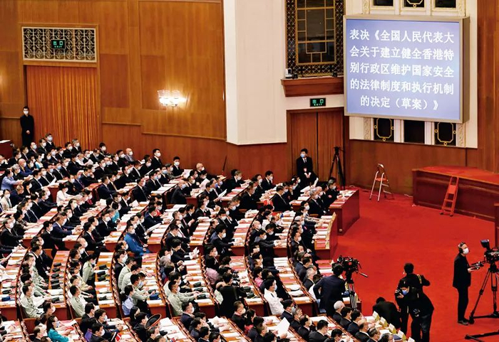 2020年5月28日，十三届全国人大三次会议高票通过《全国人民代表大会关于建立健全香港特别行政区维护国家安全的法律制度和执行机制的决定》。&nbsp;新华社记者 丁海涛/摄