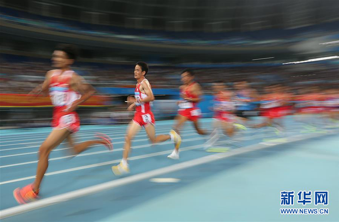 图为董国建参加第十三届全运会田径比赛。新华社记者曹灿摄