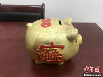 资料图：小猪储蓄罐 张维　摄
