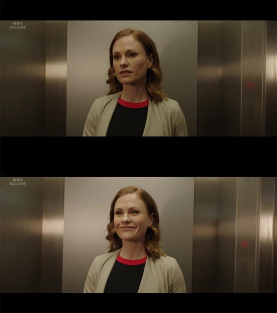 电梯里只有Robyn一个人时，她哭丧着脸，电梯打开，立即职业笑脸相迎 