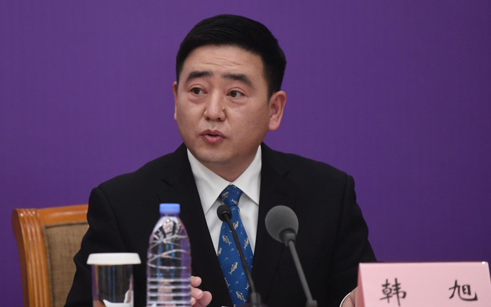农业农村部渔业渔政管理局副局长韩旭在回答记者提问。摄影/新京报记者 吴宁