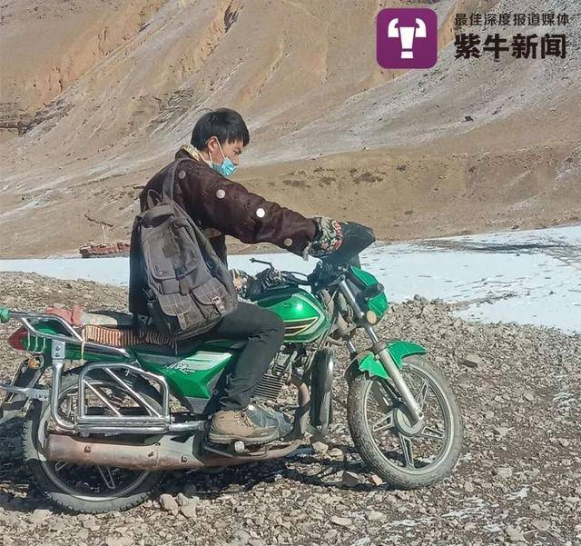 次仁曲桑骑摩托车去乡里找网络