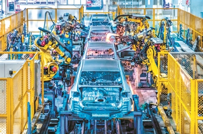  广汽本田今年将形成77万辆的年总产能，图为广汽本田的生产线。