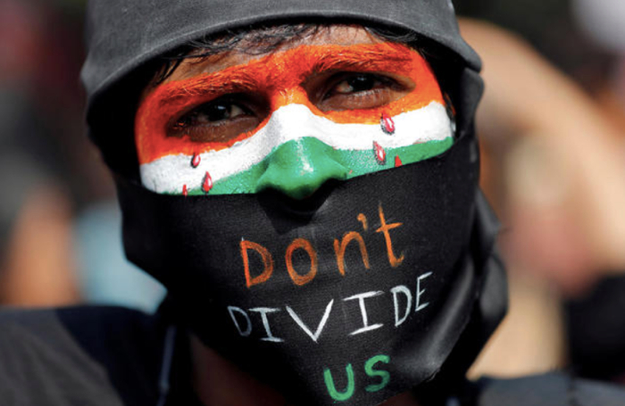 3月3日，新德里的一名抗议者，抗议《公民身份法修正案》，图片来自路透社