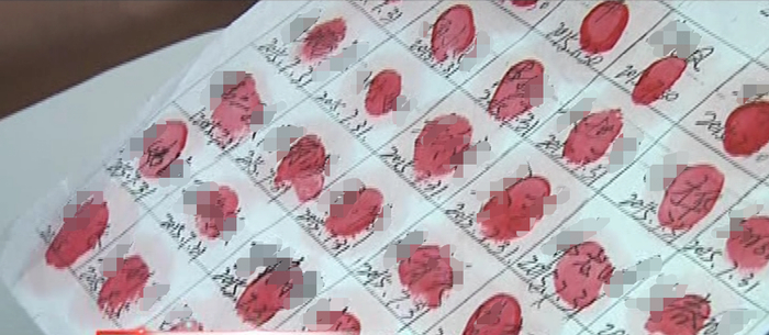 ▲温金路要求信徒签名、按手印，发誓不离开园子