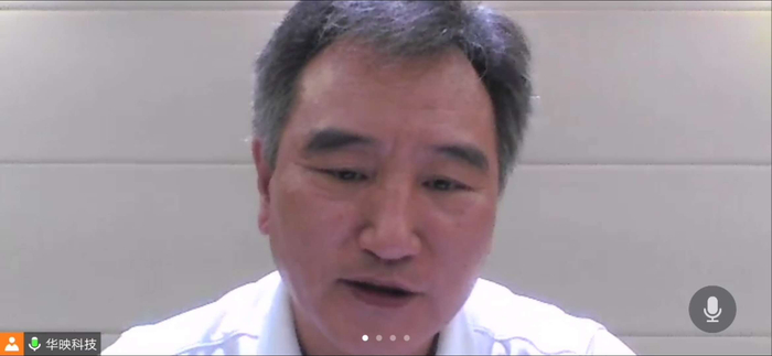 图为胡建容接受记者云采访