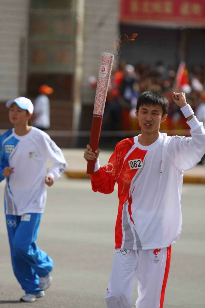 （廖宇靖参与2008年北京奥运会火炬传递 图源网络）