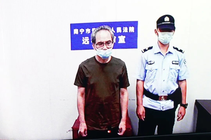 唐农接受宣判。图片来源：南宁中院&nbsp;伍彬 摄