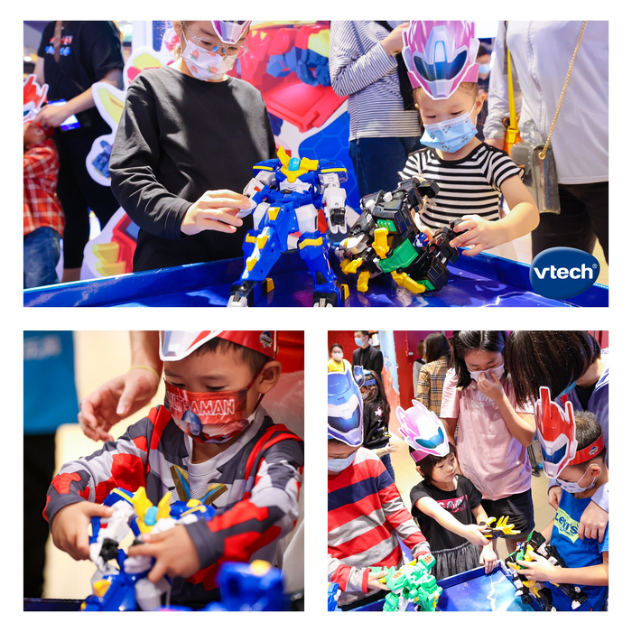 △ 小粉丝们对伟易达迷你特工队玩具爱不释手