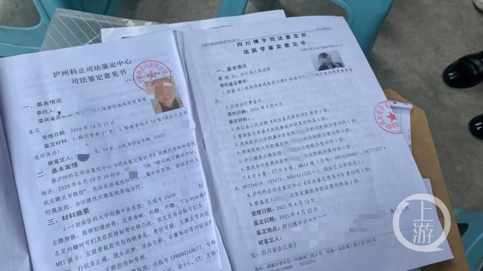 ▲李雪的两份伤残鉴定报告，均认可其至少存在10级伤残。摄影/上游新闻记者 胡磊