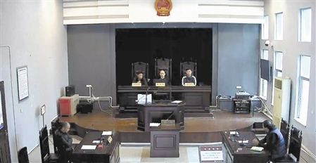 图为本案一审庭审现场。